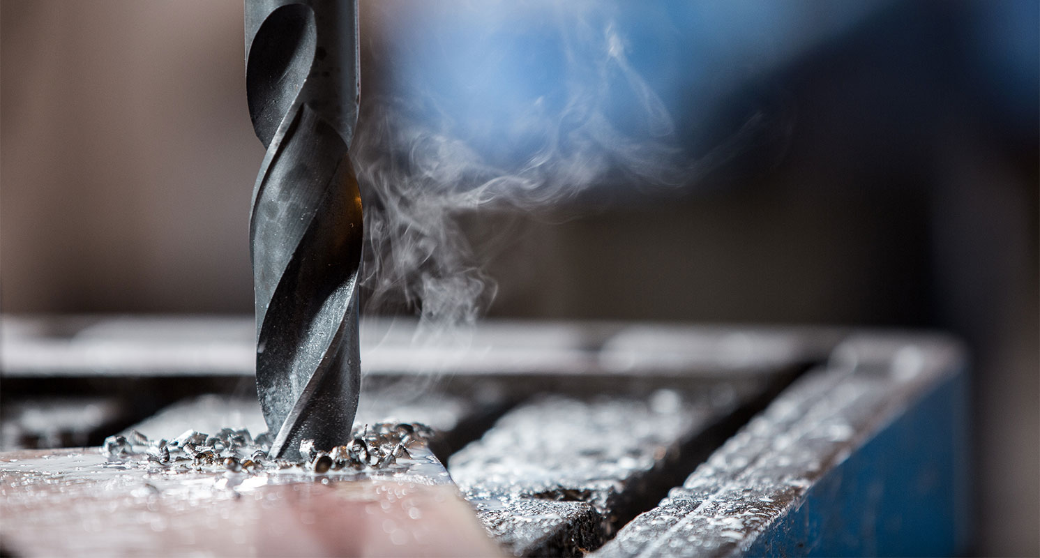 Industrial drilling and precision machining equipment in operation