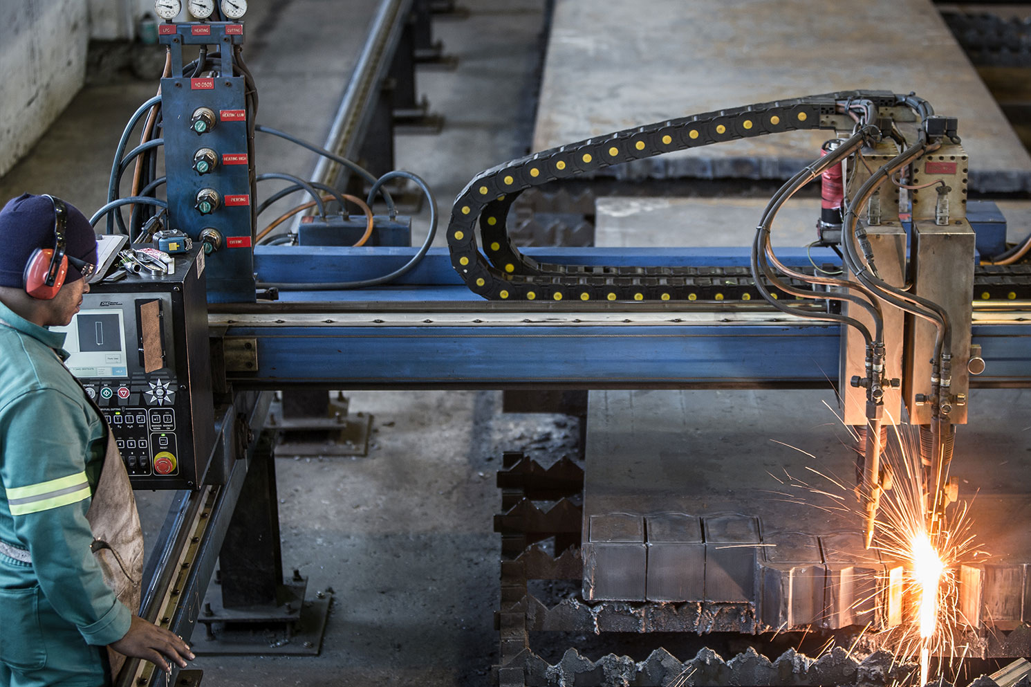 Heavy duty manufacturing equipment in a steel workshop